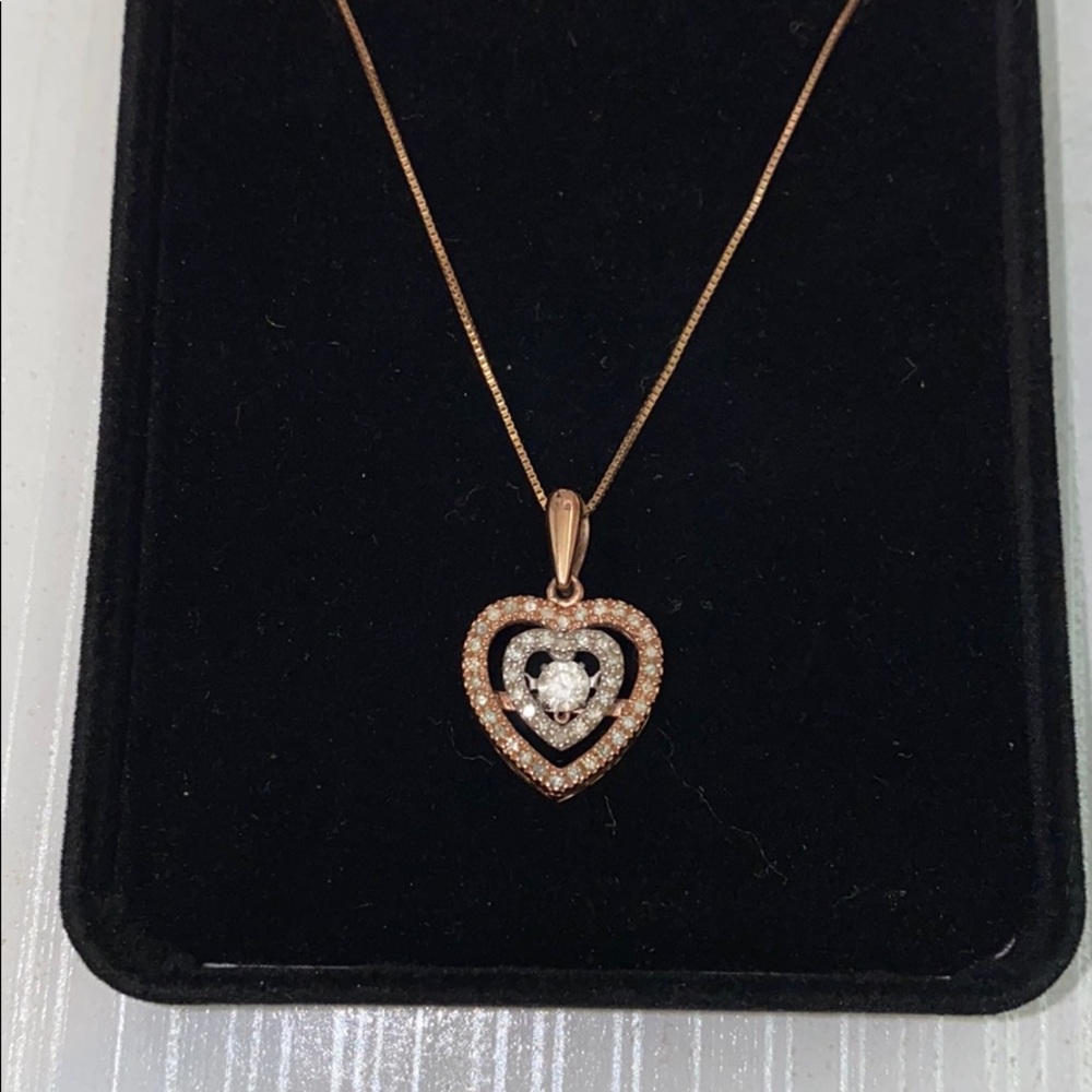 Heart necklace with a diamond